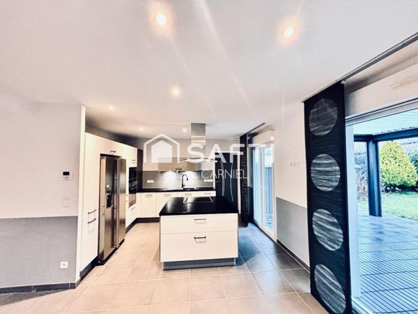 Jolie maison individuelle en limite de propriété