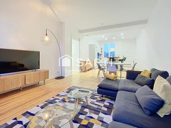 T3 rénové - immeuble en pierre avec ascenseur