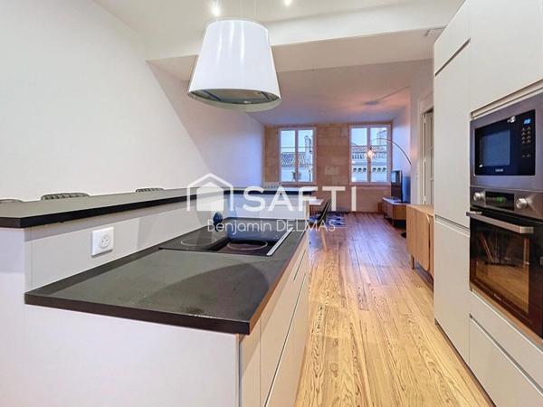 T3 rénové - immeuble en pierre avec ascenseur