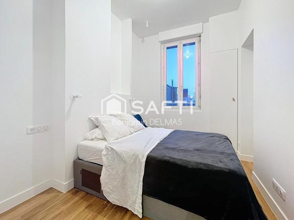 T3 rénové - immeuble en pierre avec ascenseur