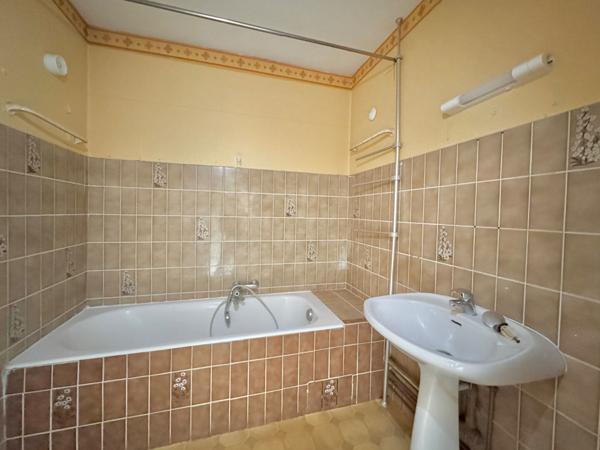 Spacieux T4 avec son garage, ses balcons, son jardin et sa cave