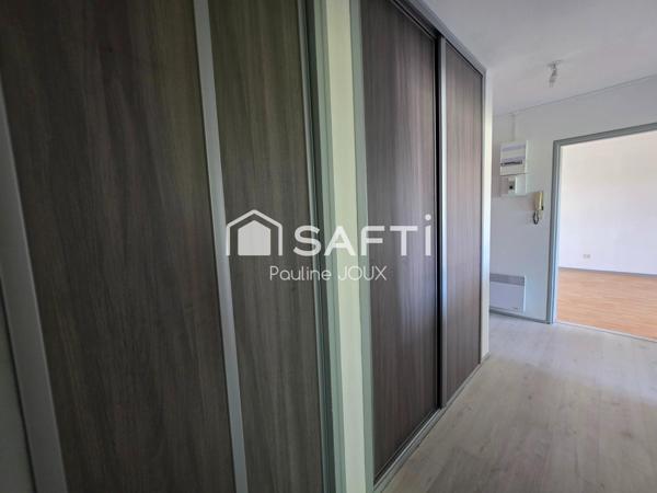 Appartement type F2 avec balcon, garage, cave et grenier