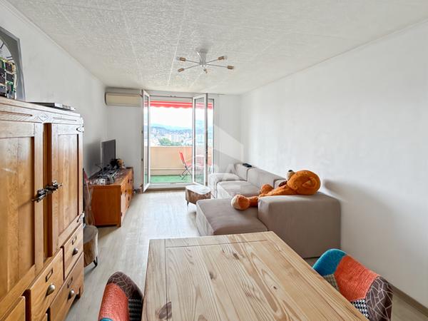 Appartement 3 pièces avec cave et stationnement privatif