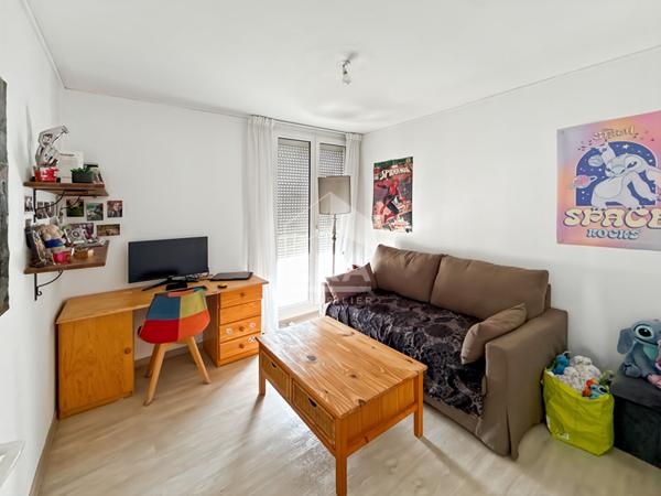 Appartement 3 pièces avec cave et stationnement privatif