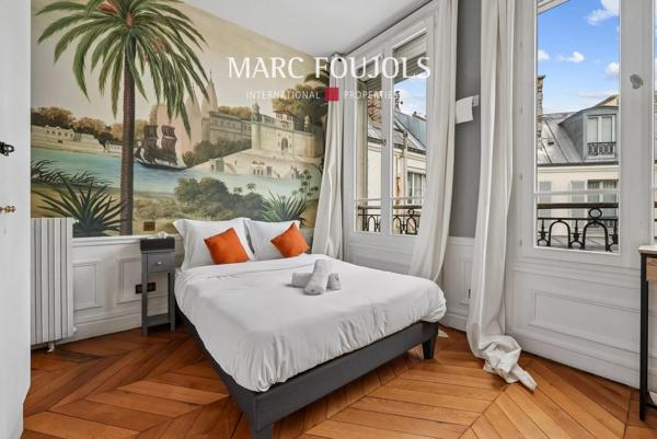 Paris 16/8 Pont de l’Alma : appartement avec vue dégagée et balcon filant