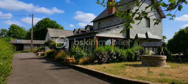A seulement 13 minutes de Mayenne, en campagne, venez découvrir cette charmante maison en pierre de 150 m2, implantée sur un terrain clos et arboré de 9420 m2.

Elle offre une cuisine aménagée et équipée avec cheminée ouverte, un salon/séjour, une véranda chauffée par le sol avec cheminée, une arrière-cuisine, une salle d'eau, un WC, une cave, un garage avec grenier et un local chaufferie.

A l'étage, vous trouverez trois chambres, un bureau (ou chambre d'appoint), une salle d'eau et deux WC.

Côté prestation : pompe à chaleur, aspirateur centralisé, portail électrique, atelier garage, bergerie, poulailler et puits.

Une propriété idéale pour une famille, d'espace et de nature, tout en restant proche de Mayenne.

A visiter sans tarder !