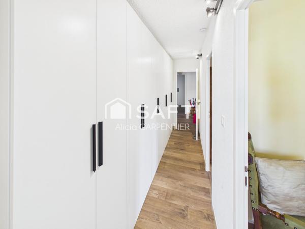 Maison rénovée de plain-pied avec trois chambres et un garage