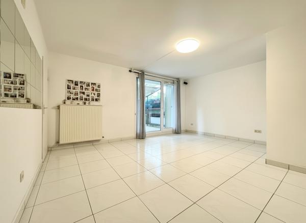Appartement 4 pièces au rez-de-chaussée avec grande terrasse