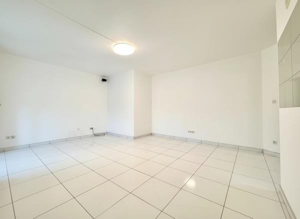 Appartement 4 pièces au rez-de-chaussée avec grande terrasse