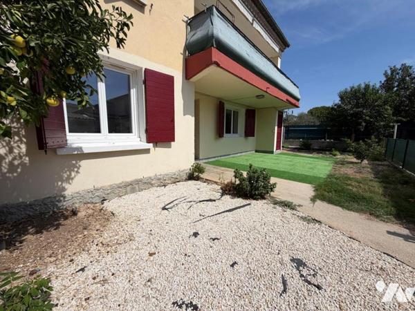 Bas de villa avec grand jardin et double garage T4