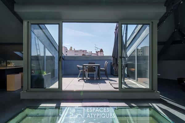 Hôtel particulier et sa terrasse sur les toits