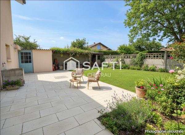 Appartement en rez-de-jardin, coeur de Bâgé-le-Châtel