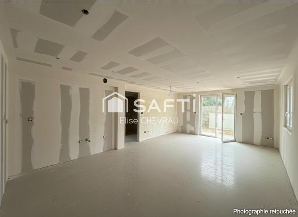 Appartement en rez-de-jardin, coeur de Bâgé-le-Châtel