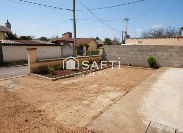 Appartement en rez-de-jardin, coeur de Bâgé-le-Châtel