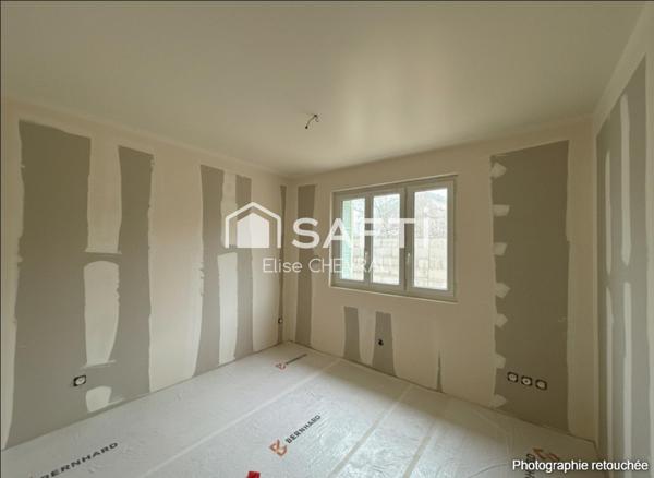 Appartement en rez-de-jardin, coeur de Bâgé-le-Châtel