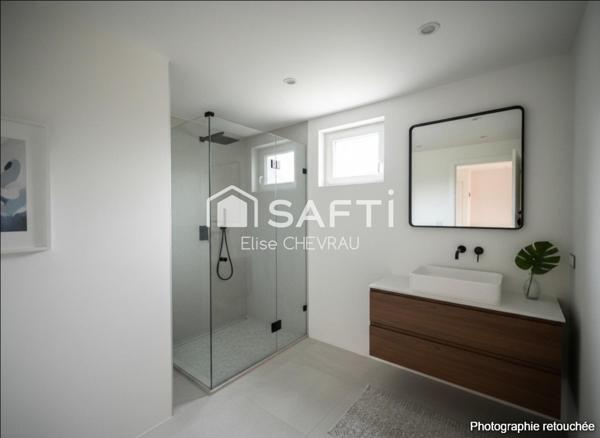 Appartement en rez-de-jardin, coeur de Bâgé-le-Châtel