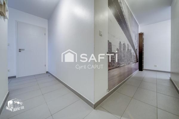 Superbe F3, grande terrasse, garage fermé, cave