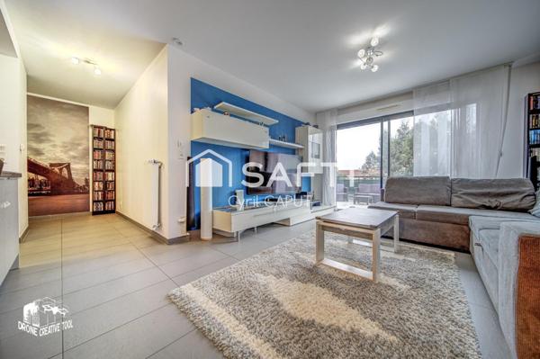 Superbe F3, grande terrasse, garage fermé, cave