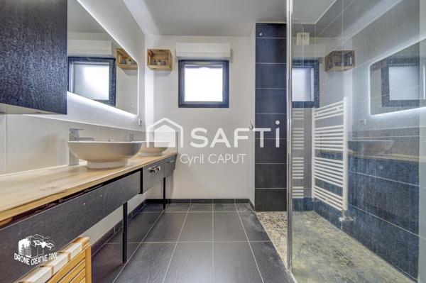 Superbe F3, grande terrasse, garage fermé, cave