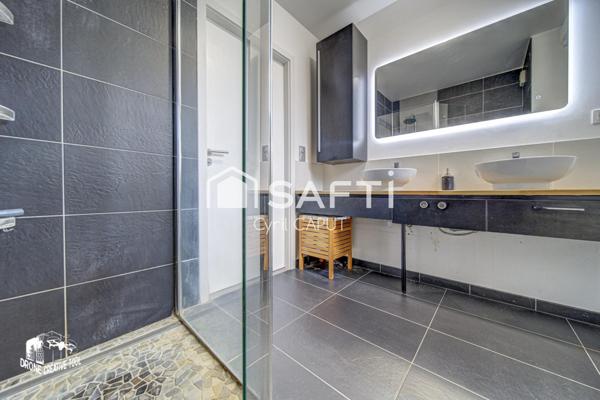 Superbe F3, grande terrasse, garage fermé, cave