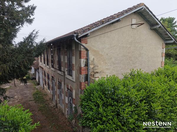A Vendre Maison de plain-pied de 100 m² avec dépendance et jardin sur la commune de Mézin
