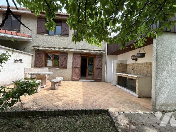 Maison mitoyenne d'un coté