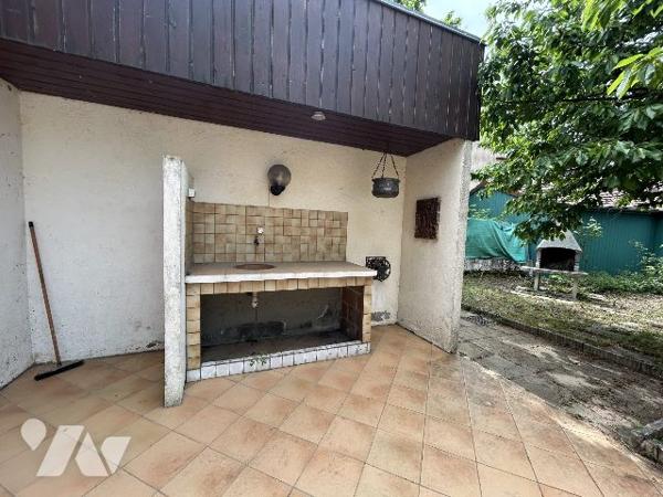 Maison mitoyenne d'un coté