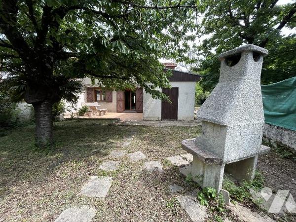 Maison mitoyenne d'un coté