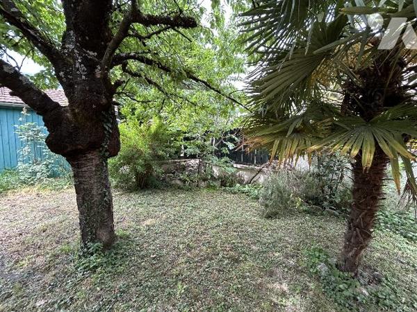 Maison mitoyenne d'un coté