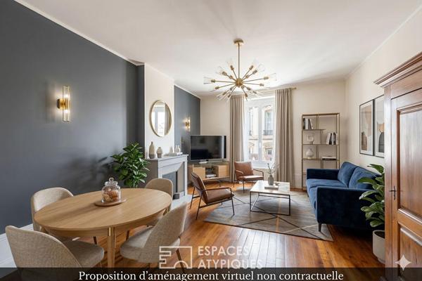 Appartement ancien en plein centre avec jardin, caves et grenier