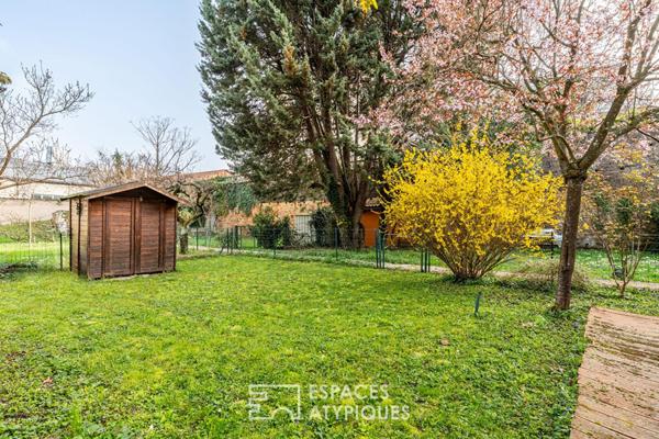 Appartement ancien en plein centre avec jardin, caves et grenier