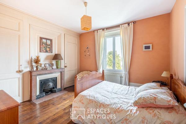 Appartement ancien en plein centre avec jardin, caves et grenier