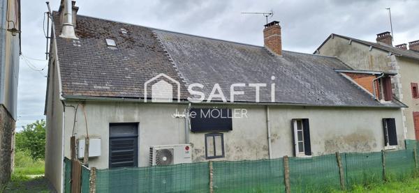 Maison avec potentiel d'agrandissement et vue campagne.