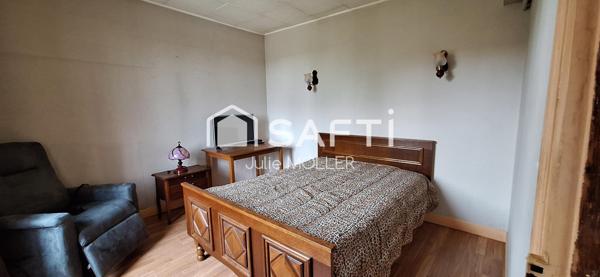 Maison avec potentiel d'agrandissement et vue campagne.