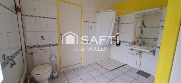 Maison avec potentiel d'agrandissement et vue campagne.