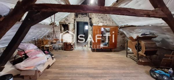 Maison avec potentiel d'agrandissement et vue campagne.