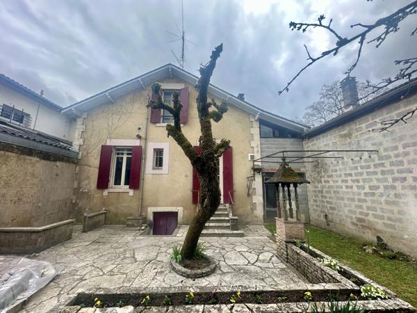Maison à rénover avec grand atelier et dépendances – Fort potentiel à Bergerac