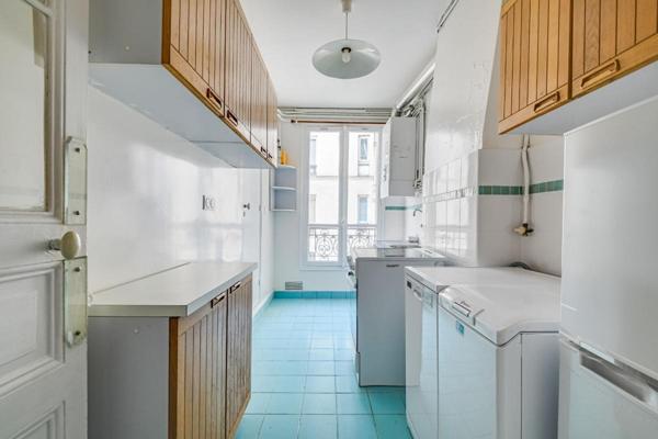 Paris 14ème - Immeuble Haussmannien - 3 pièces (53,30 m²) avec vue sur "Réservoir Montsouris"  à 2 pas du Parc Montsouris