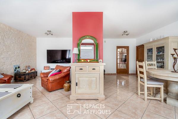 Maison familiale avec jardin et local commercial