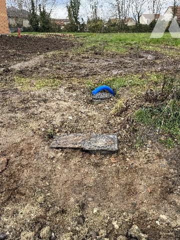 Terrain à bâtir, plat, en centre bourg