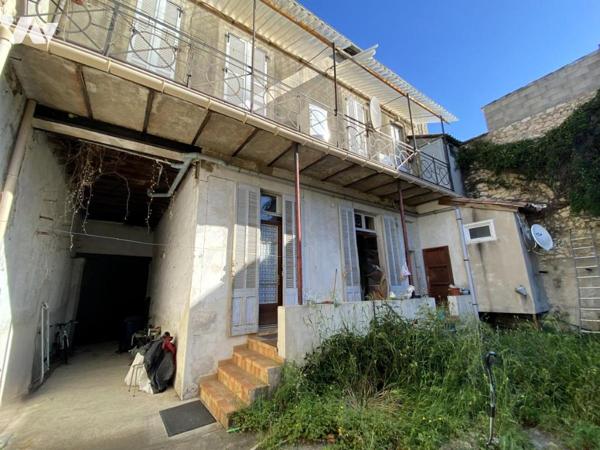 Maison de ville en R+1 avec jardin