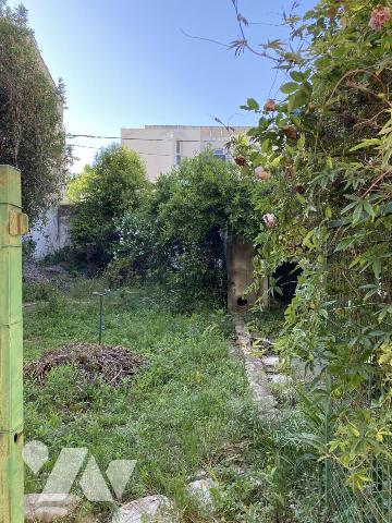 Maison de ville en R+1 avec jardin