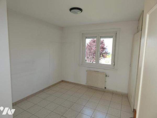 Comines, maison semi individuelle trois chambres jardin et garage