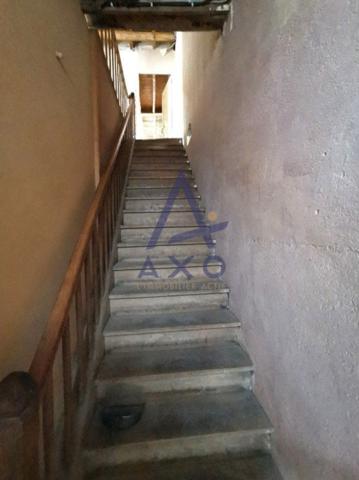 Immeuble avec entrepôt et dépendances à rénover au centre de Mussidan