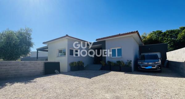 Contemporaine de plain-pied : piscine, 3 chambres, bureau et grand garage