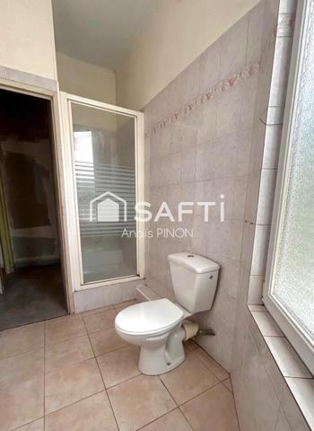 Maison de ville à rénover - T5 de 97m² - garage - jardin - cave