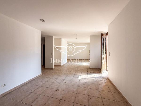 Appartement T4 en rez-de-chaussée + cour
