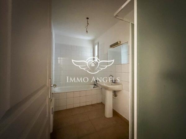 Appartement T4 en rez-de-chaussée + cour