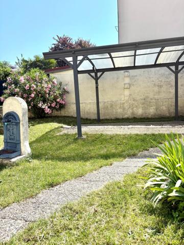 Maison de caractère avec jardin, garage et atelier – Un véritable coup de cœur !