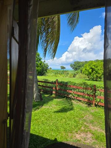 VUE MER Maison avec piscine + 5 bungalows et piscine commune, plage à pied à Sainte Rose (971)